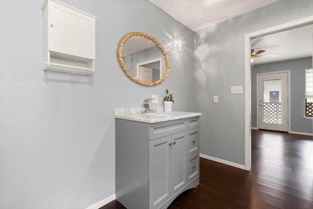 150 Lazy Ln, Livingston, TX 77351 - bathroom with hardwood / wood-style floors, ceiling fan, and vanity