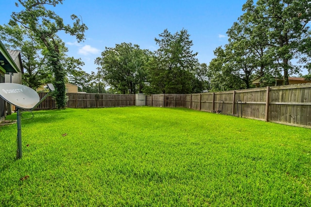 150 Lazy Ln, Livingston, TX 77351 - view of fenced backyard