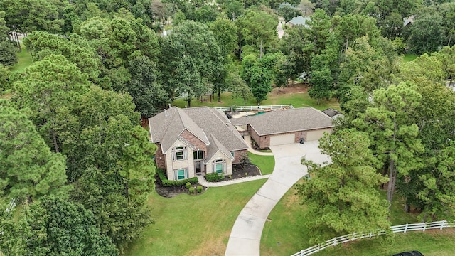 32926 Leafy Oak Ct, Magnolia, TX 77354 - view of property location with a forest
