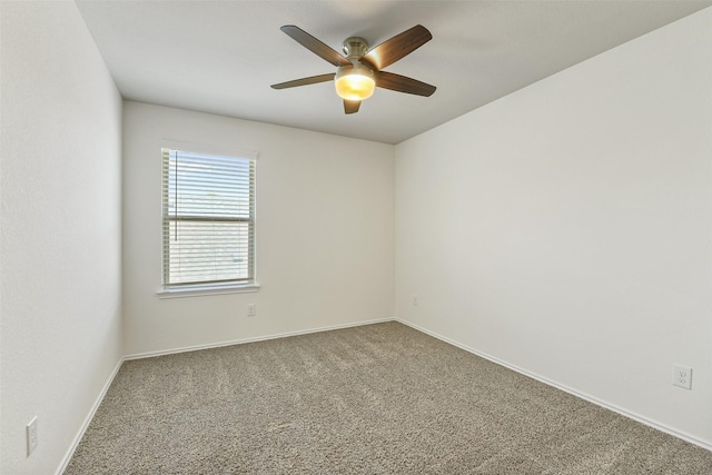 16833 Pink Wintergreen Dr, Conroe, TX 77385 - carpeted empty room featuring a ceiling fan and baseboards