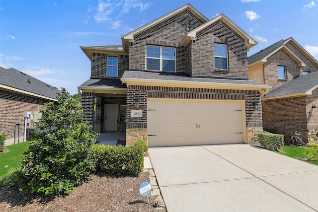 16833 Pink Wintergreen Dr, Conroe, TX 77385 - traditional home featuring driveway, brick siding, a garage, and stone siding