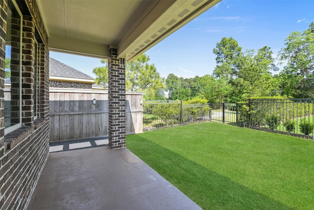 16833 Pink Wintergreen Dr, Conroe, TX 77385 - fenced backyard featuring a patio area