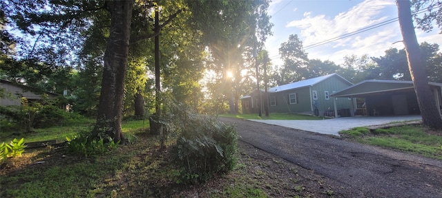 20 Connor Ln, Huntsville, TX 77320 - view of front of property with driveway and an attached carport