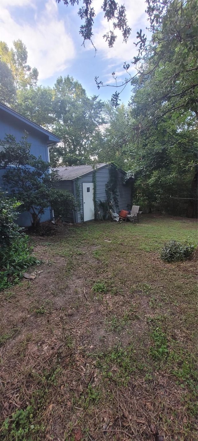 20 Connor Ln, Huntsville, TX 77320 - view of yard featuring a storage shed
