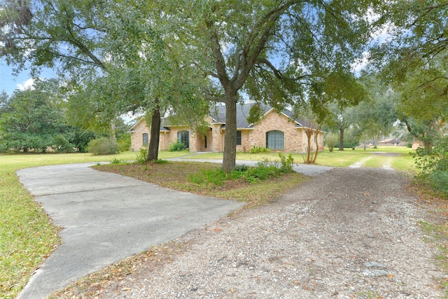 1628 Vauthier St, La Marque, TX 77568 - view of front of house with driveway and a front yard