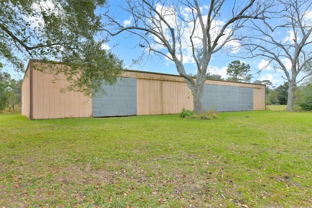 1628 Vauthier St, La Marque, TX 77568 - view of grassy yard featuring an outbuilding and an outdoor structure