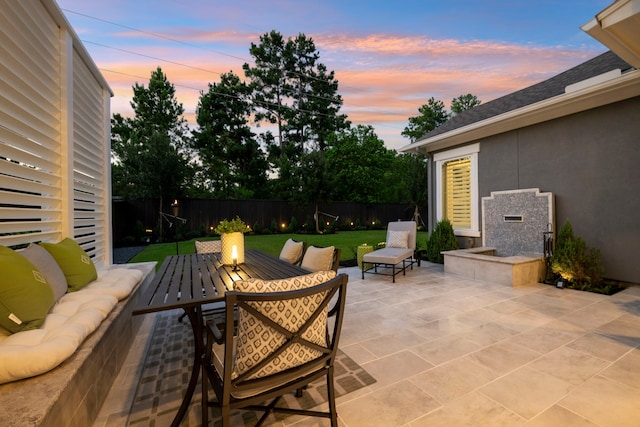 43 W Sawyer Ridge Dr, Spring, TX 77389 - fenced backyard with a patio area and outdoor dining space
