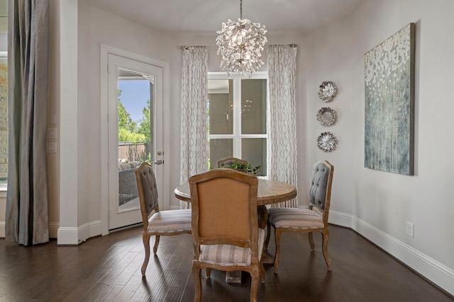 43 W Sawyer Ridge Dr, Spring, TX 77389 - dining room featuring a chandelier and dark wood-style flooring