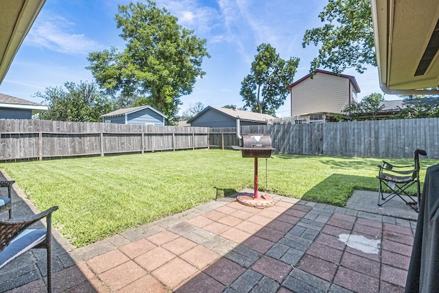 201 E 5th St, Deer Park, TX 77536 - fenced backyard with a patio area