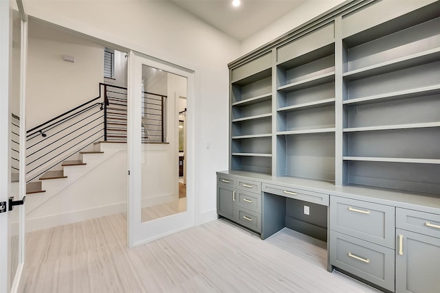 7106 Dearborn St, Houston, TX 77055 - unfurnished office with light wood-style flooring, built in study area, and recessed lighting