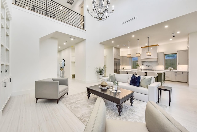 7106 Dearborn St, Houston, TX 77055 - living room with recessed lighting and a chandelier