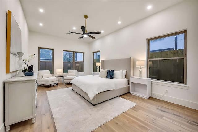 7106 Dearborn St, Houston, TX 77055 - bedroom with recessed lighting, light wood finished floors, and a ceiling fan