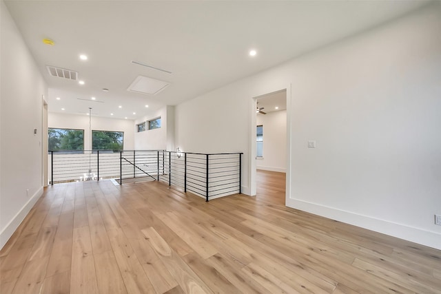 7106 Dearborn St, Houston, TX 77055 - empty room featuring light wood-type flooring, recessed lighting, and a smoke detector