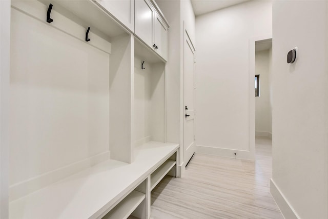 7106 Dearborn St, Houston, TX 77055 - mudroom with baseboards and light wood-style flooring