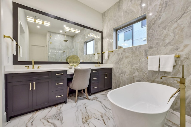 7106 Dearborn St, Houston, TX 77055 - bathroom with marble tiled flooring, double vanity, a marble finish shower, a freestanding bath, and tile walls