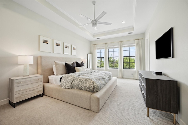 1207 W 24th St Unit A, Houston, TX 77008 - bedroom featuring a tray ceiling, light colored carpet, a ceiling fan, ornamental molding, and recessed lighting