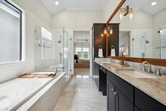 1207 W 24th St Unit A, Houston, TX 77008 - bathroom featuring lofted ceiling, a whirlpool tub, double vanity, and a stall shower