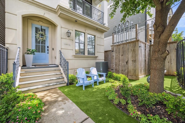 1207 W 24th St Unit A, Houston, TX 77008 - doorway to property featuring a balcony and stucco siding