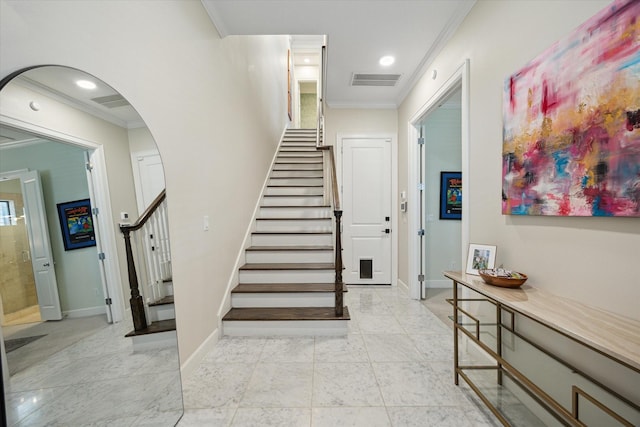 1207 W 24th St Unit A, Houston, TX 77008 - stairs featuring crown molding, arched walkways, and recessed lighting