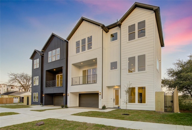 410 N Nagle St, Houston, TX 77003 - view of property with an attached garage, driveway, and board and batten siding