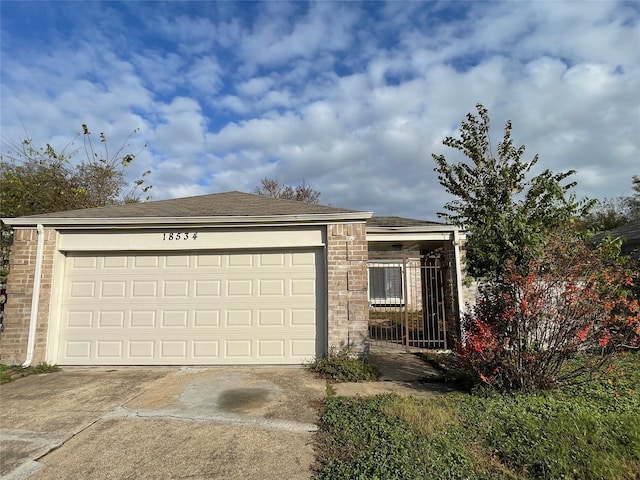 18534 Trail Bend Ln, Houston, TX 77084 - garage featuring concrete driveway