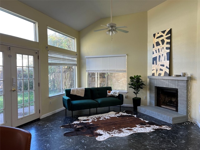 18534 Trail Bend Ln, Houston, TX 77084 - living room with a ceiling fan, healthy amount of natural light, high vaulted ceiling, a fireplace, and french doors