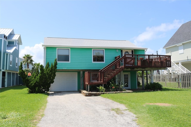 16542 John Silver Rd, Jamaica Beach, TX 77554 - raised beach house with stairway, a garage, gravel driveway, and a deck