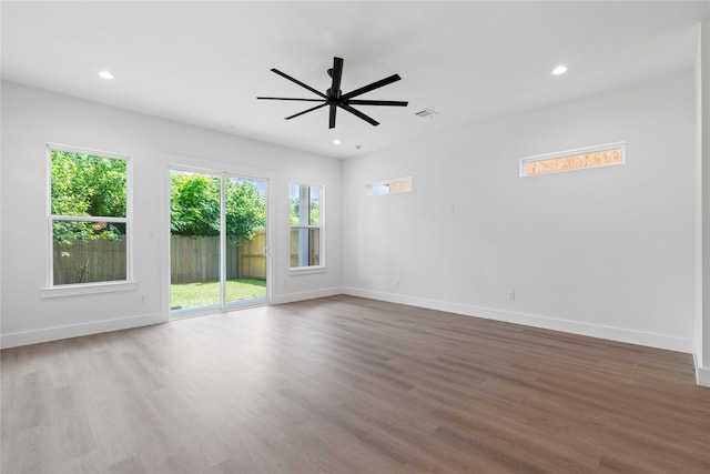 412 E 34th St, Houston, TX 77018 - unfurnished room featuring wood finished floors, a ceiling fan, and recessed lighting
