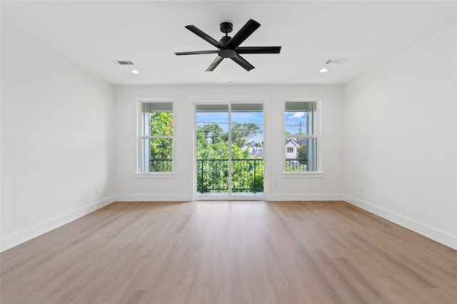 412 E 34th St, Houston, TX 77018 - unfurnished room featuring light wood-style floors, a ceiling fan, and recessed lighting