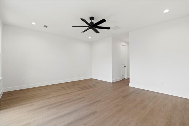 412 E 34th St, Houston, TX 77018 - spare room featuring light wood-style floors, recessed lighting, and ceiling fan