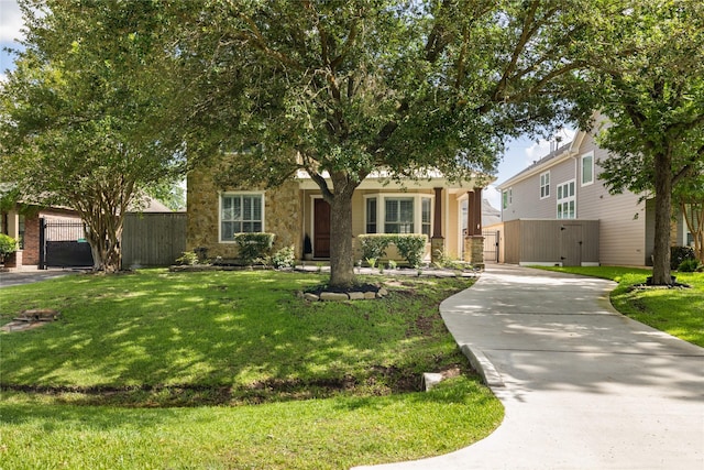 983 W 42nd St, Houston, TX 77018 - view of property hidden behind natural elements with a gate