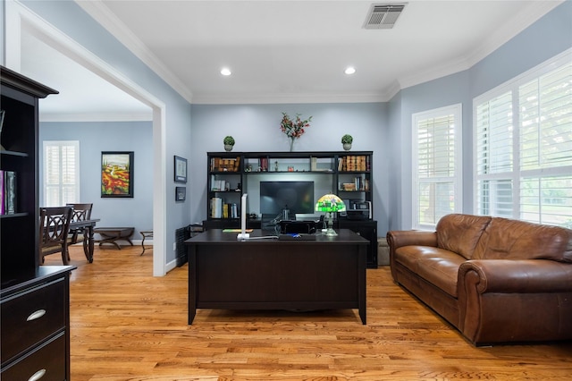 983 W 42nd St, Houston, TX 77018 - office space with healthy amount of natural light, light wood finished floors, ornamental molding, and recessed lighting