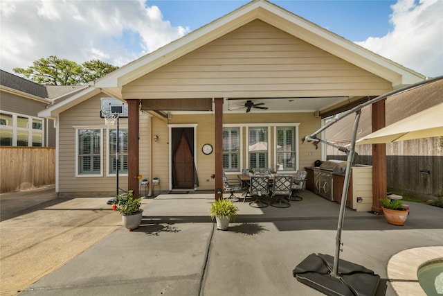 983 W 42nd St, Houston, TX 77018 - exterior space with ceiling fan, a patio area, an outdoor kitchen, and outdoor dining space