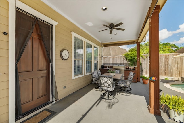 983 W 42nd St, Houston, TX 77018 - view of patio / terrace featuring an outdoor kitchen, a ceiling fan, and outdoor dining space