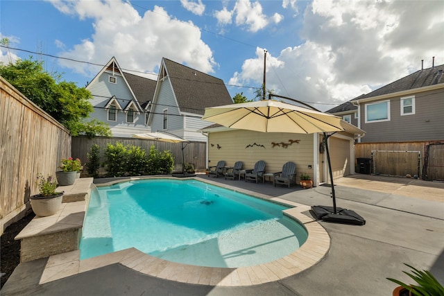 983 W 42nd St, Houston, TX 77018 - view of swimming pool with a fenced backyard and a patio