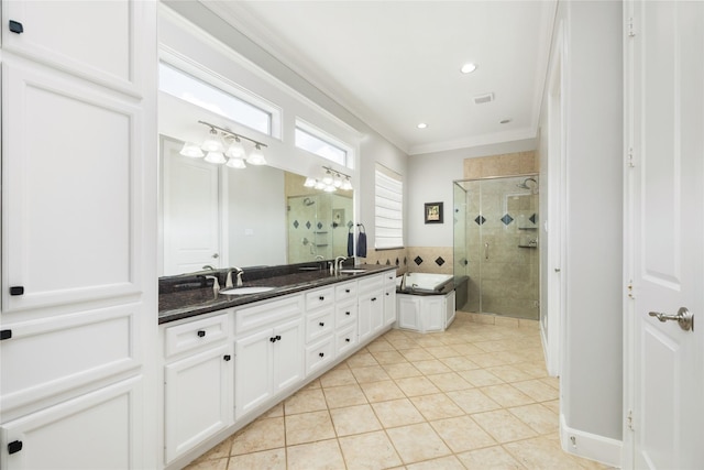 983 W 42nd St, Houston, TX 77018 - full bath featuring a shower stall, tile patterned flooring, double vanity, ornamental molding, and recessed lighting
