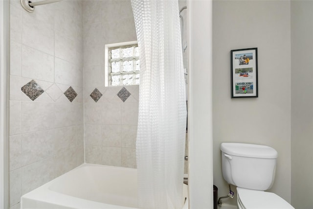 983 W 42nd St, Houston, TX 77018 - bathroom featuring shower / tub combo and toilet