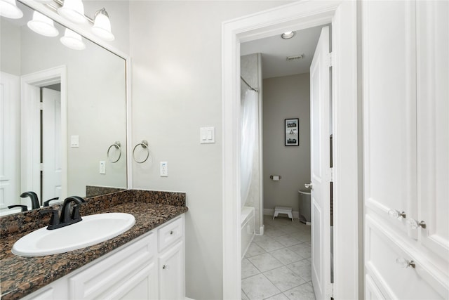 983 W 42nd St, Houston, TX 77018 - bathroom with vanity, tile patterned flooring, and shower / tub combo