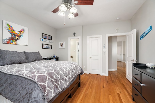 983 W 42nd St, Houston, TX 77018 - bedroom featuring light wood-style floors and ceiling fan