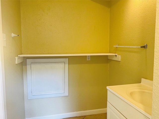 11530 Bellerive Dr, Houston, TX 77072 - bathroom featuring vanity and tile patterned flooring