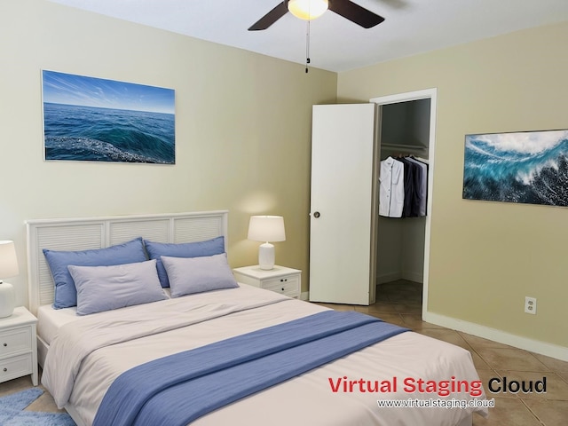 11530 Bellerive Dr, Houston, TX 77072 - tiled bedroom with a spacious closet, a closet, and a ceiling fan