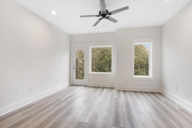 6723 Saint Augustine St, Houston, TX 77021 - unfurnished room with light wood finished floors and a ceiling fan