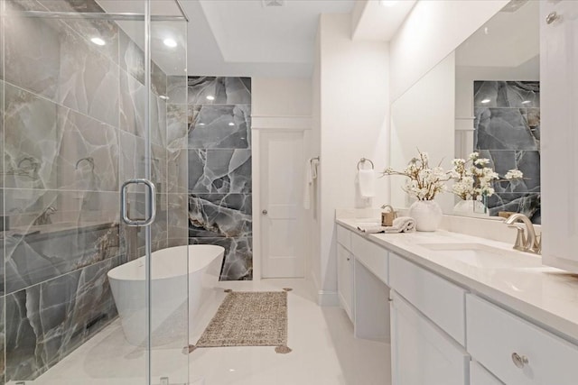 6723 Saint Augustine St, Houston, TX 77021 - full bathroom featuring double vanity, a freestanding tub, a stall shower, and recessed lighting