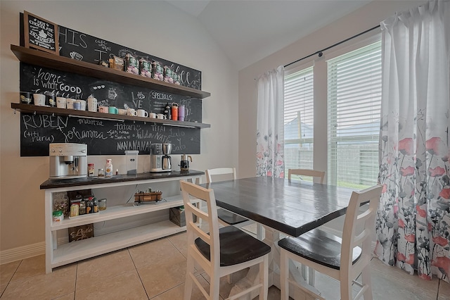 4227 Lodge Ranch Ct, Fulshear, TX 77441 - dining room with lofted ceiling and tile patterned floors