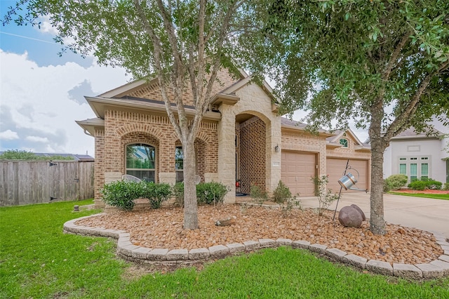 4227 Lodge Ranch Ct, Fulshear, TX 77441 - french provincial home featuring brick siding, concrete driveway, an attached garage, and stone siding