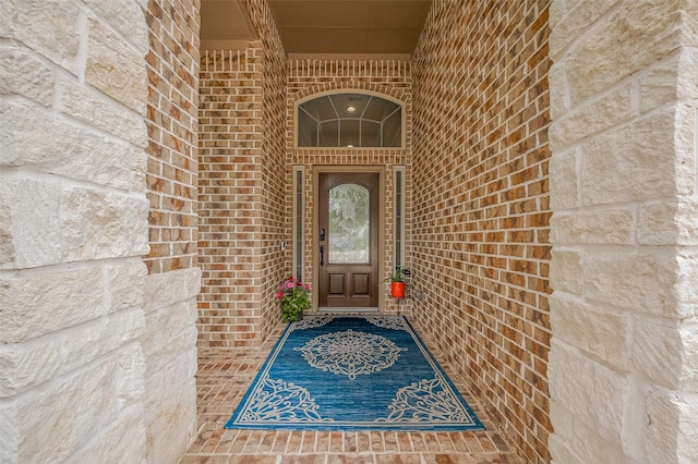 4227 Lodge Ranch Ct, Fulshear, TX 77441 - doorway to property featuring brick siding and stone siding