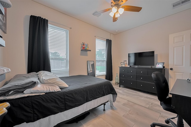 4227 Lodge Ranch Ct, Fulshear, TX 77441 - bedroom with a ceiling fan and a desk