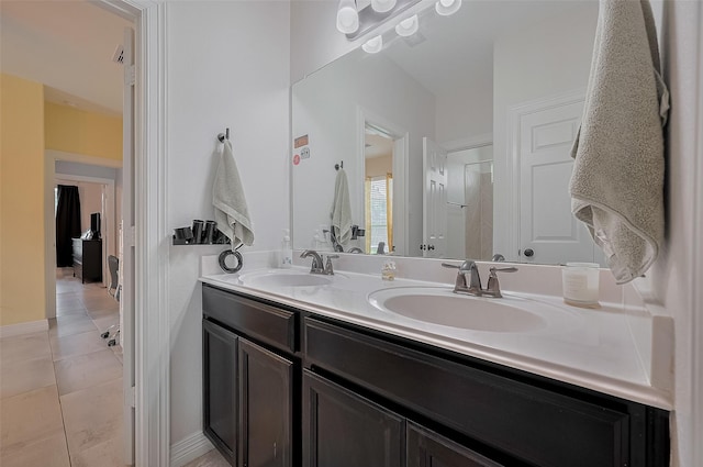 4227 Lodge Ranch Ct, Fulshear, TX 77441 - bathroom featuring double vanity and tile patterned floors