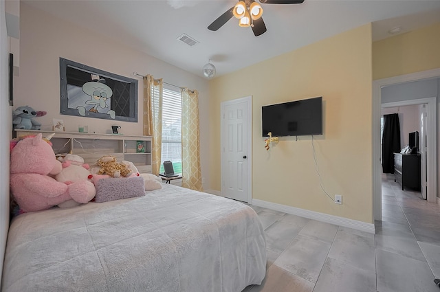4227 Lodge Ranch Ct, Fulshear, TX 77441 - tiled bedroom with baseboards and a ceiling fan