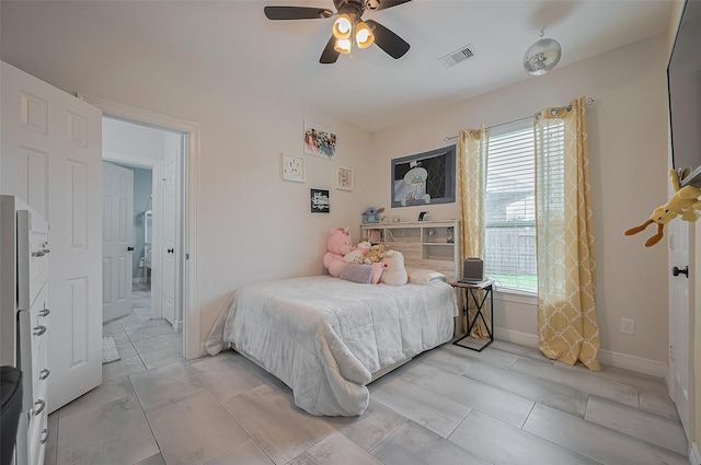 4227 Lodge Ranch Ct, Fulshear, TX 77441 - bedroom with baseboards and a ceiling fan
